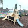 wooden climbing frame with slide