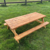wooden picnic table with benches